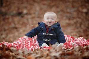 6 month baby boy in fall leaves