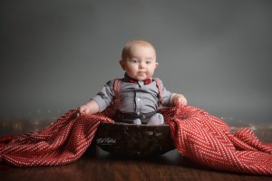 6 month baby boy in basket with bow tie