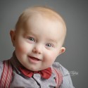 smiling 6 month baby boy portrait