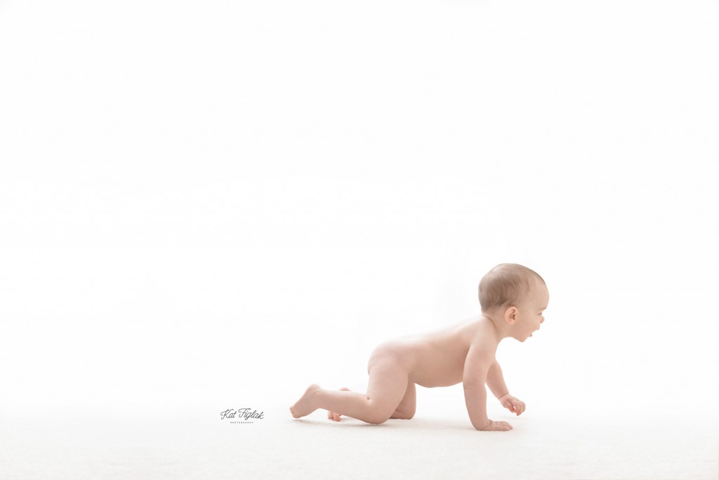 9 month old baby boy crawling