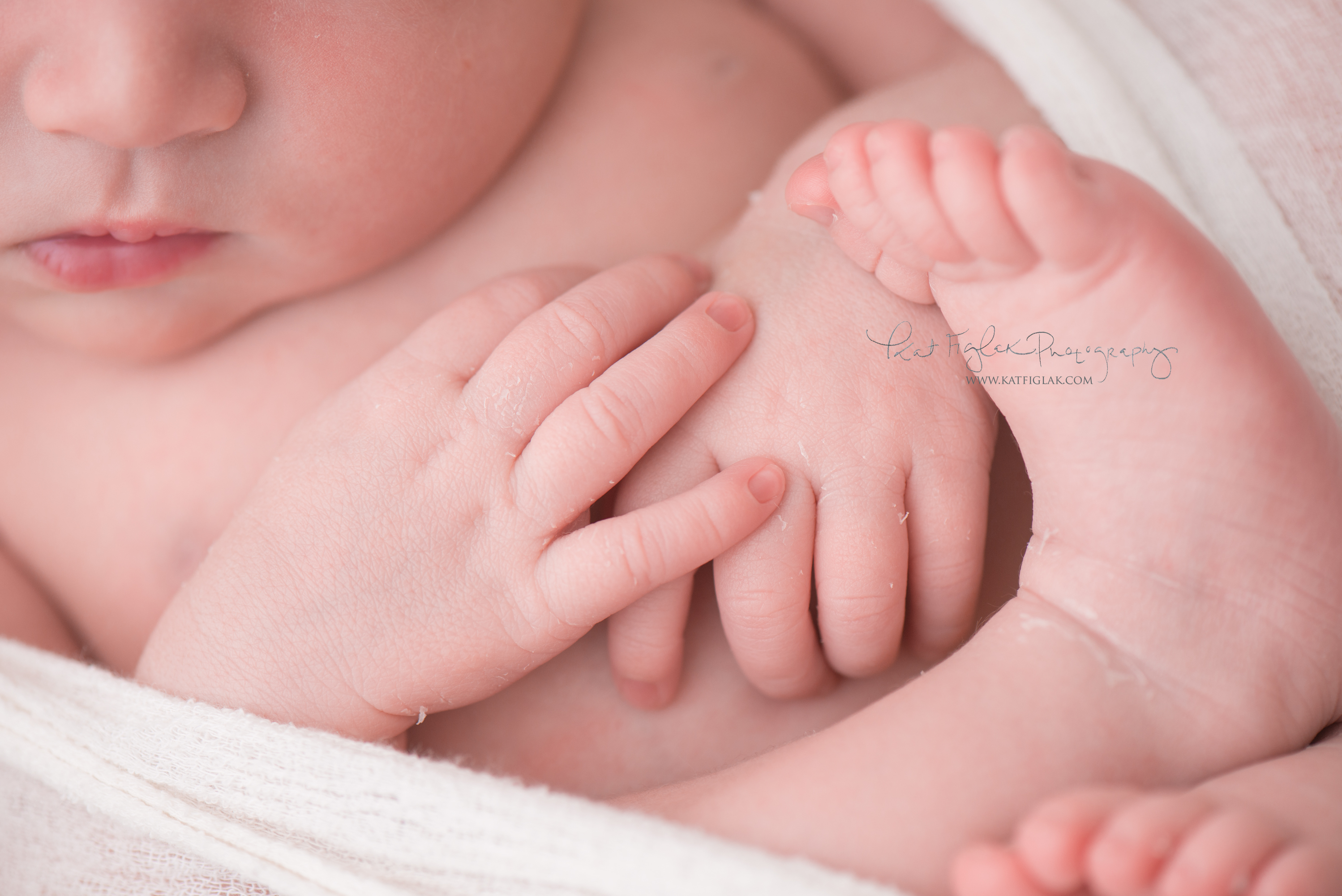 detail photo shot of baby girls hands and toes
