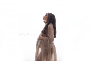 pregnant mom wearing mii-estillo Ethens boho gown